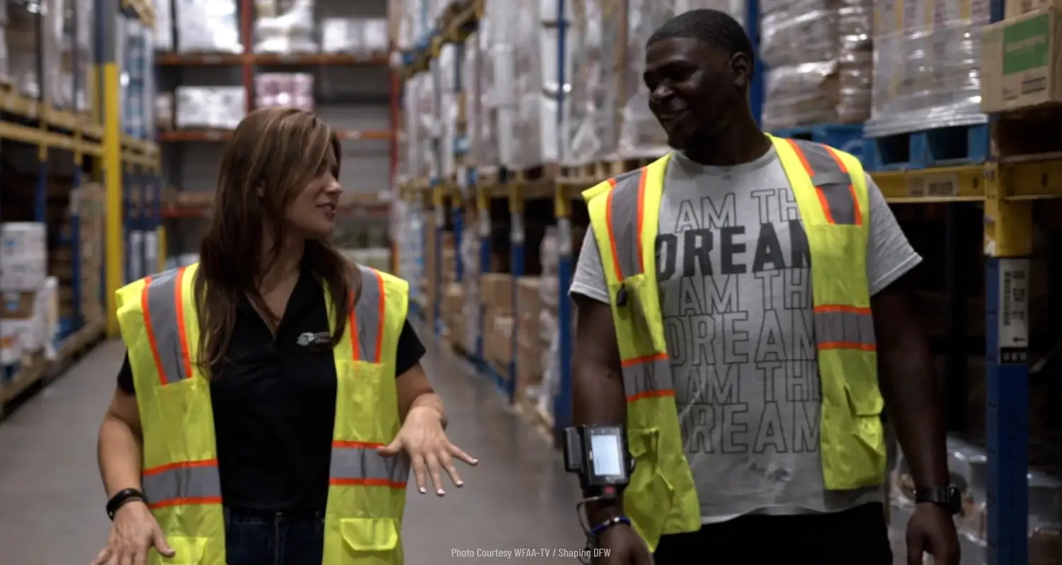 Cheri Garcia and a Cornbread Hustle employee in a warehouse
